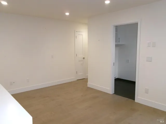an empty room with closet