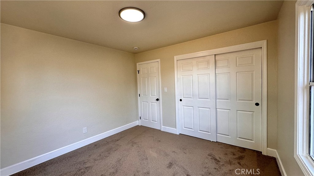 2404 Miller Avenue Modesto, CA 95354 - Photo 13 of 15 an empty room with closet area