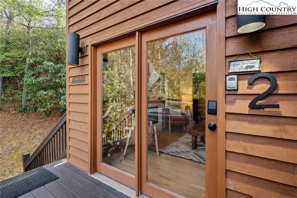 a view of a balcony and painting on the wall