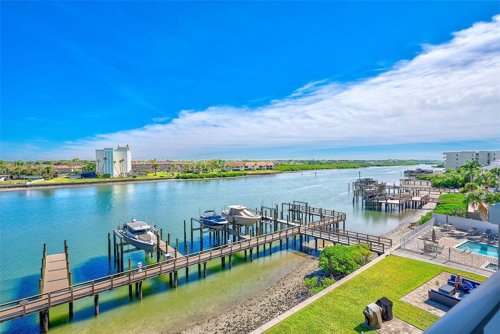 20001 Gulf Boulevard, Unit 403 Indian Shores, FL 33785 - Photo 28 of 43 a view of a lake with a terrace