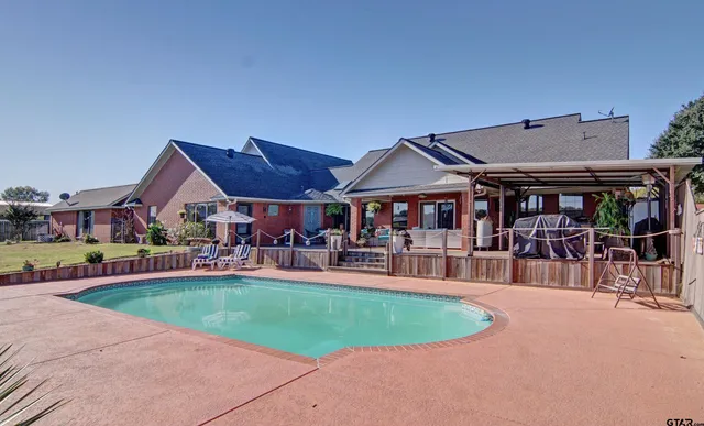 a view of a chairs and tables in the patio