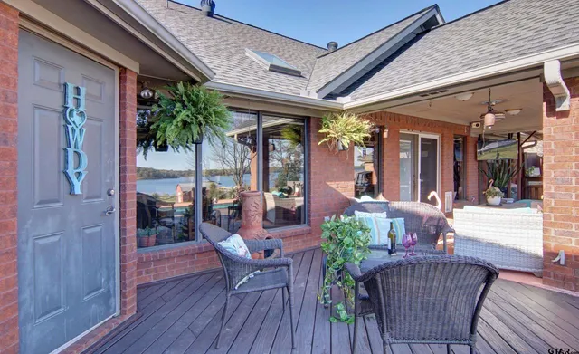 a view of a chairs and table in the patio
