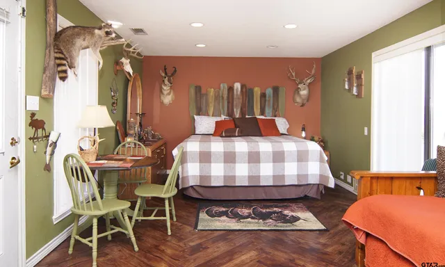 a bathroom with a sink vanity and a mirror