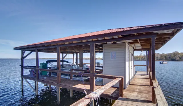 a aerial view of a house with a yard