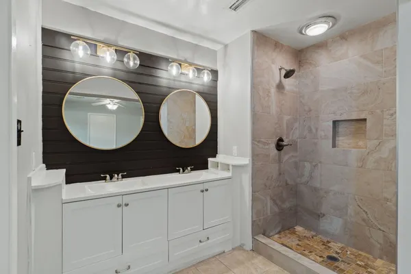 a bathroom with a toilet and a sink