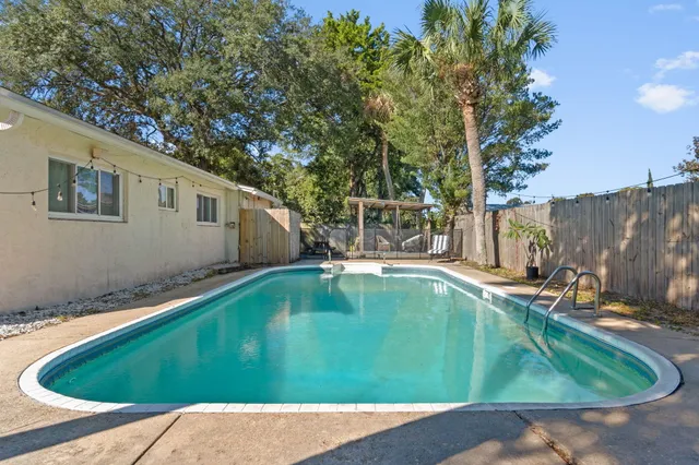 a view of a backyard with a slide