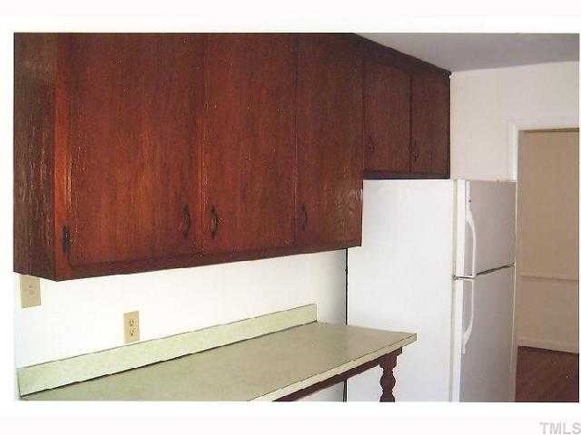 2913 Bardwell Road Raleigh, NC 27604 - Photo 6 of 7 a kitchen with a refrigerator freezer and a dishwasher