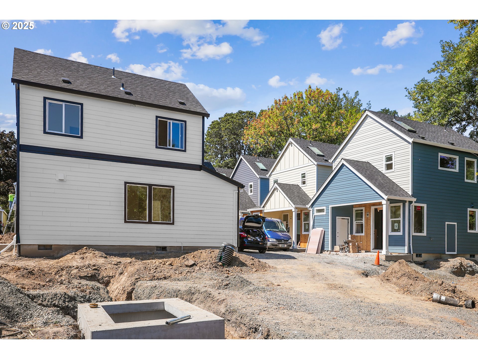 9560 Southwest 91st Avenue, Unit 3 Portland, OR 97223 - Photo 11 of 15 a front view of a house with a yard