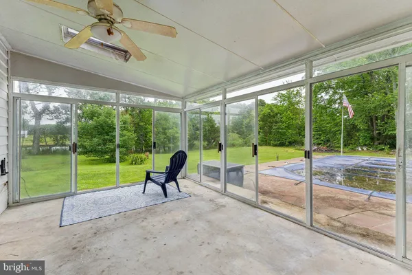 a view of a room with porch and furniture