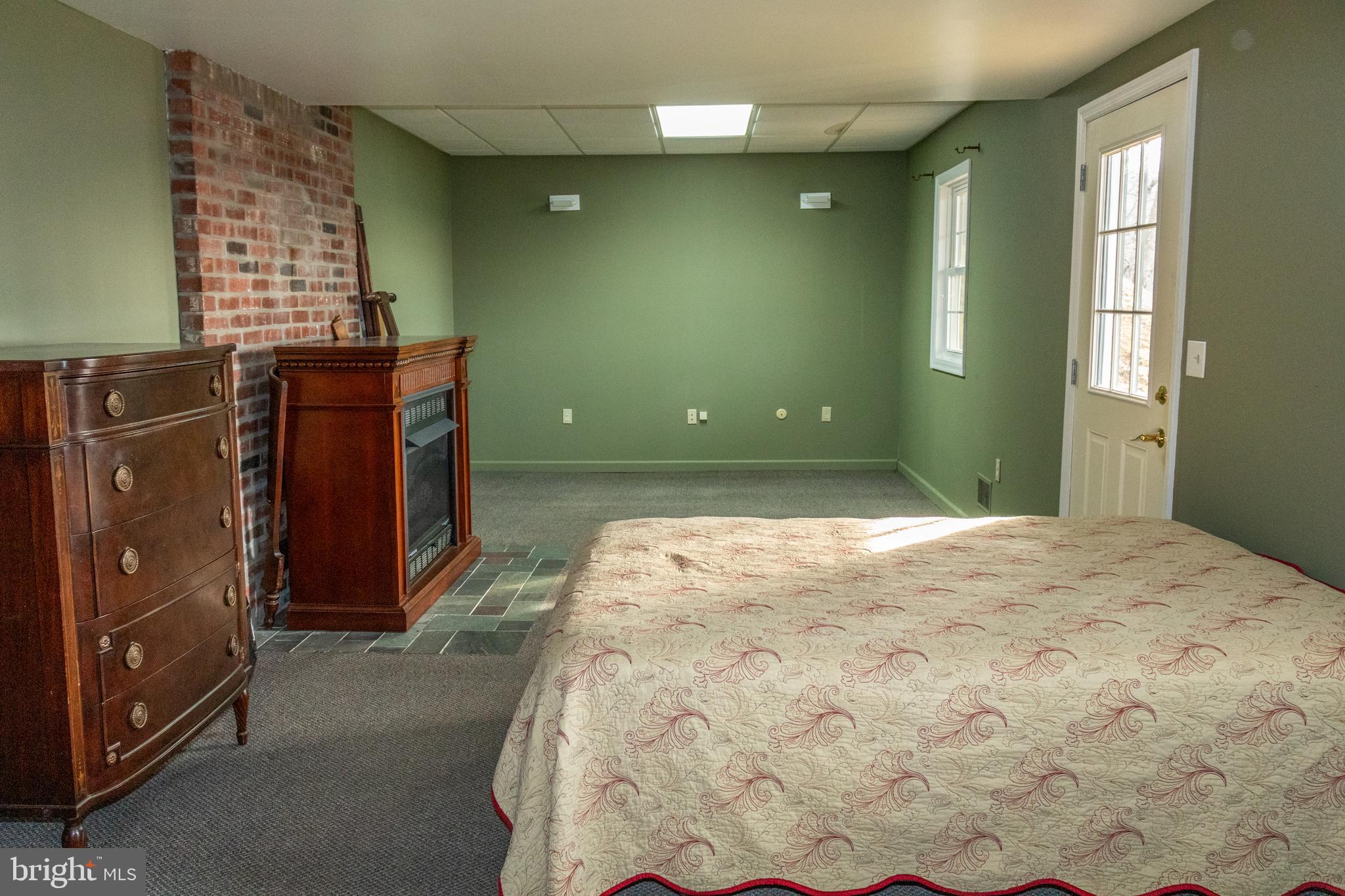 163 Pleasant Valley Road Titusville, NJ 08560 - Photo 35 of 38 Lower Floor Bedroom with door to outside