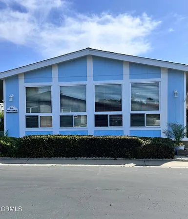 a kitchen with granite countertop stainless steel appliances and cabinets