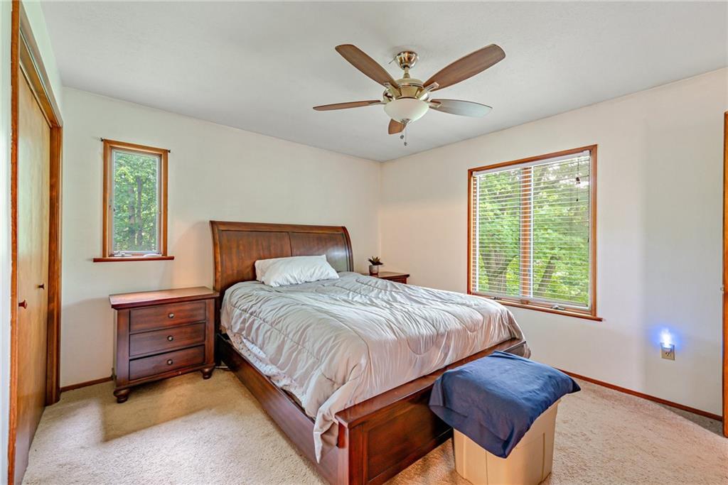 257 Fallen Timber Road Avella, PA 15312 - Photo 12 of 32 a bedroom with a bed next to a window