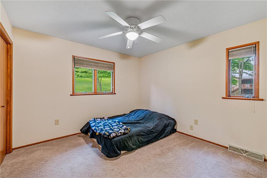 257 Fallen Timber Road Avella, PA 15312 - Photo 17 of 32 a bedroom with a bed and a window