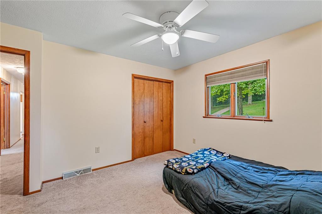 257 Fallen Timber Road Avella, PA 15312 - Photo 18 of 32 a bedroom with bed and a window