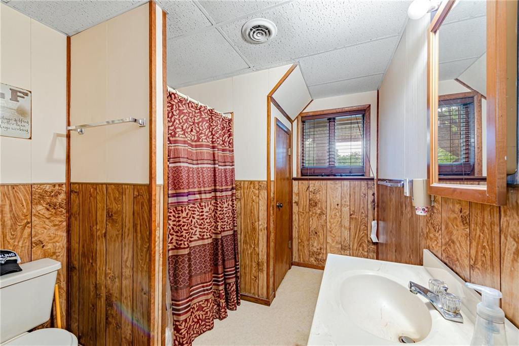 257 Fallen Timber Road Avella, PA 15312 - Photo 25 of 32 a bathroom with a sink toilet and shower