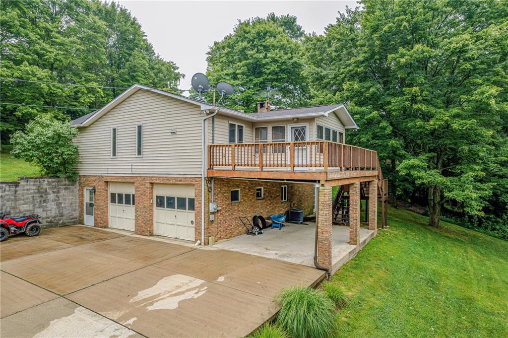 257 Fallen Timber Road Avella, PA 15312 - Photo 26 of 32 a view of a house with a yard and sitting area
