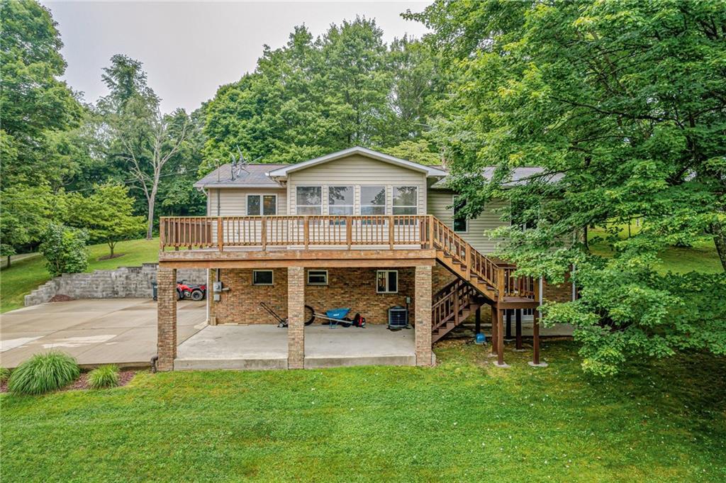257 Fallen Timber Road Avella, PA 15312 - Photo 27 of 32 a view of a house with a yard balcony and sitting area