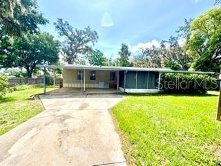 17530 Broad Street Montverde, FL 34756 - Photo 1 of 1 a view of a house with a backyard