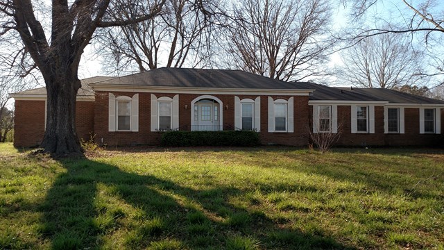 1841 Bonner Gilbert Road Macon, GA 31220 - Photo 1 of 20 a house that has a tree in front of a house