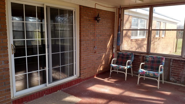 1841 Bonner Gilbert Road Macon, GA 31220 - Photo 15 of 20 a view of a chair and table in a room