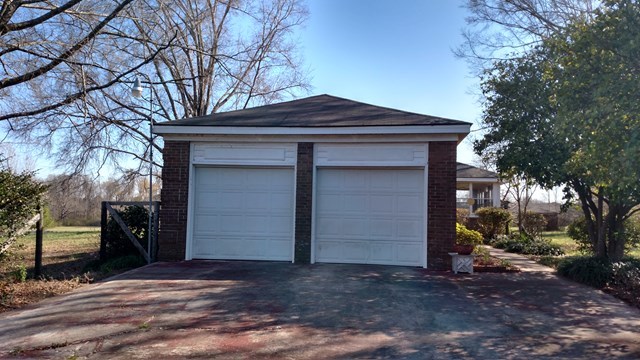 1841 Bonner Gilbert Road Macon, GA 31220 - Photo 16 of 20 a house with trees in front of it