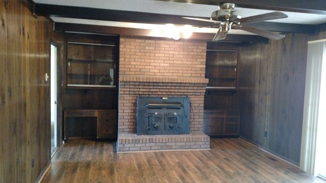 1841 Bonner Gilbert Road Macon, GA 31220 - Photo 18 of 20 a view of an empty room with a fireplace and a window