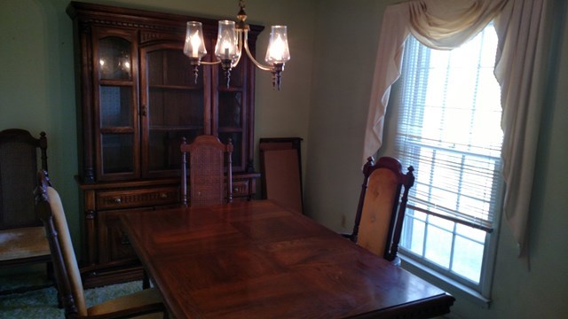 1841 Bonner Gilbert Road Macon, GA 31220 - Photo 8 of 20 a view of hall way with furniture and chandelier