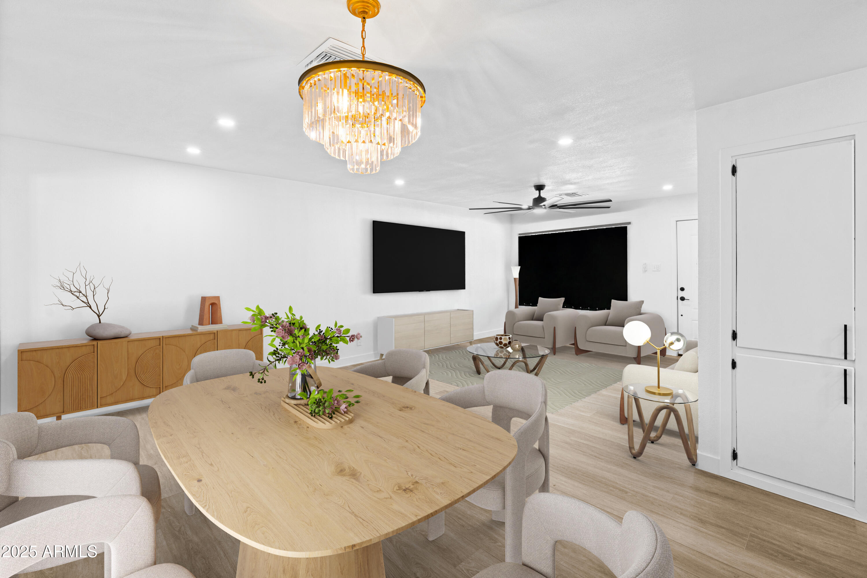 901 West Mercer Lane Phoenix, AZ 85029 - Photo 19 of 40 a living room with furniture and a flat screen tv