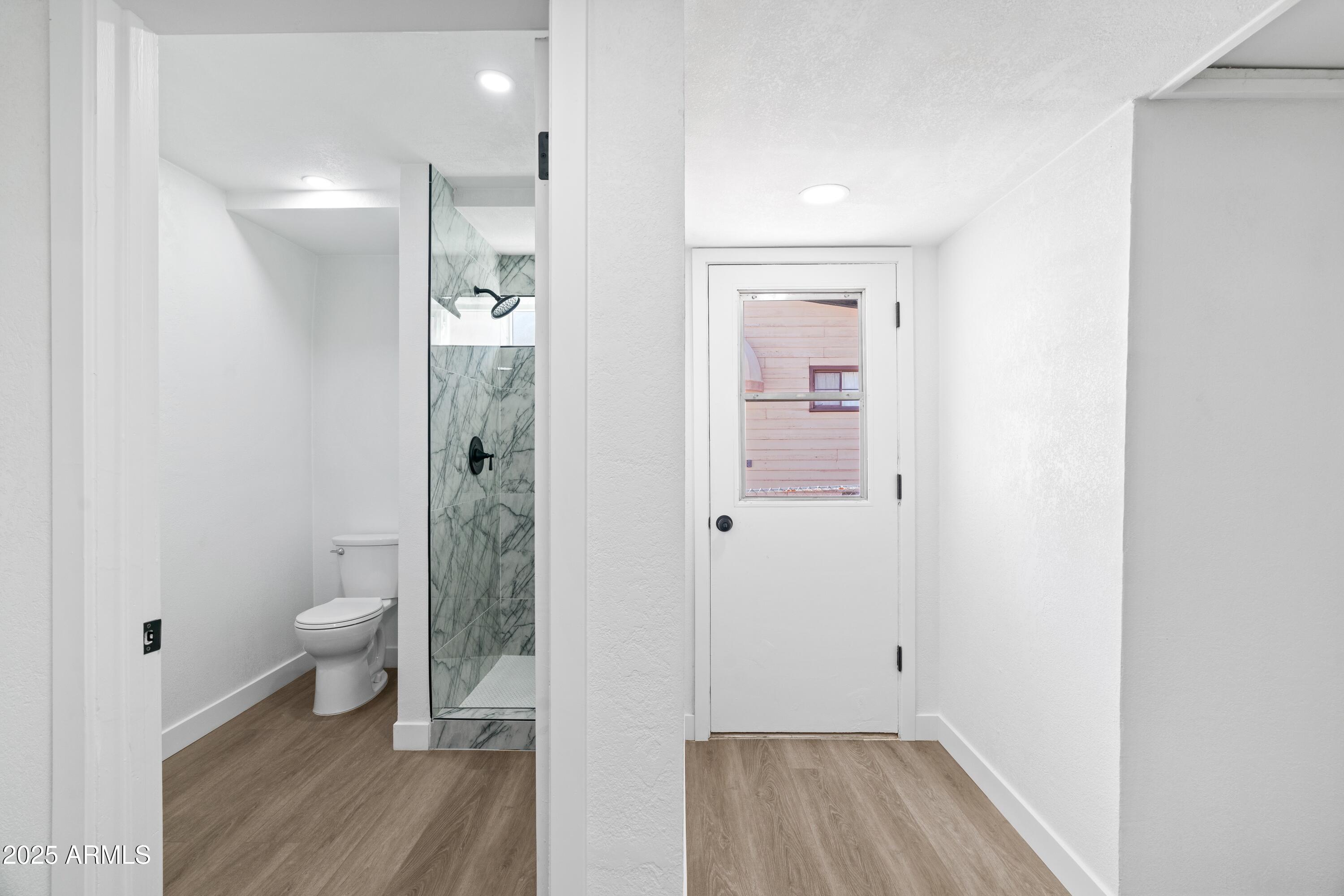 901 West Mercer Lane Phoenix, AZ 85029 - Photo 28 of 40 a bathroom with a sink and a toilet