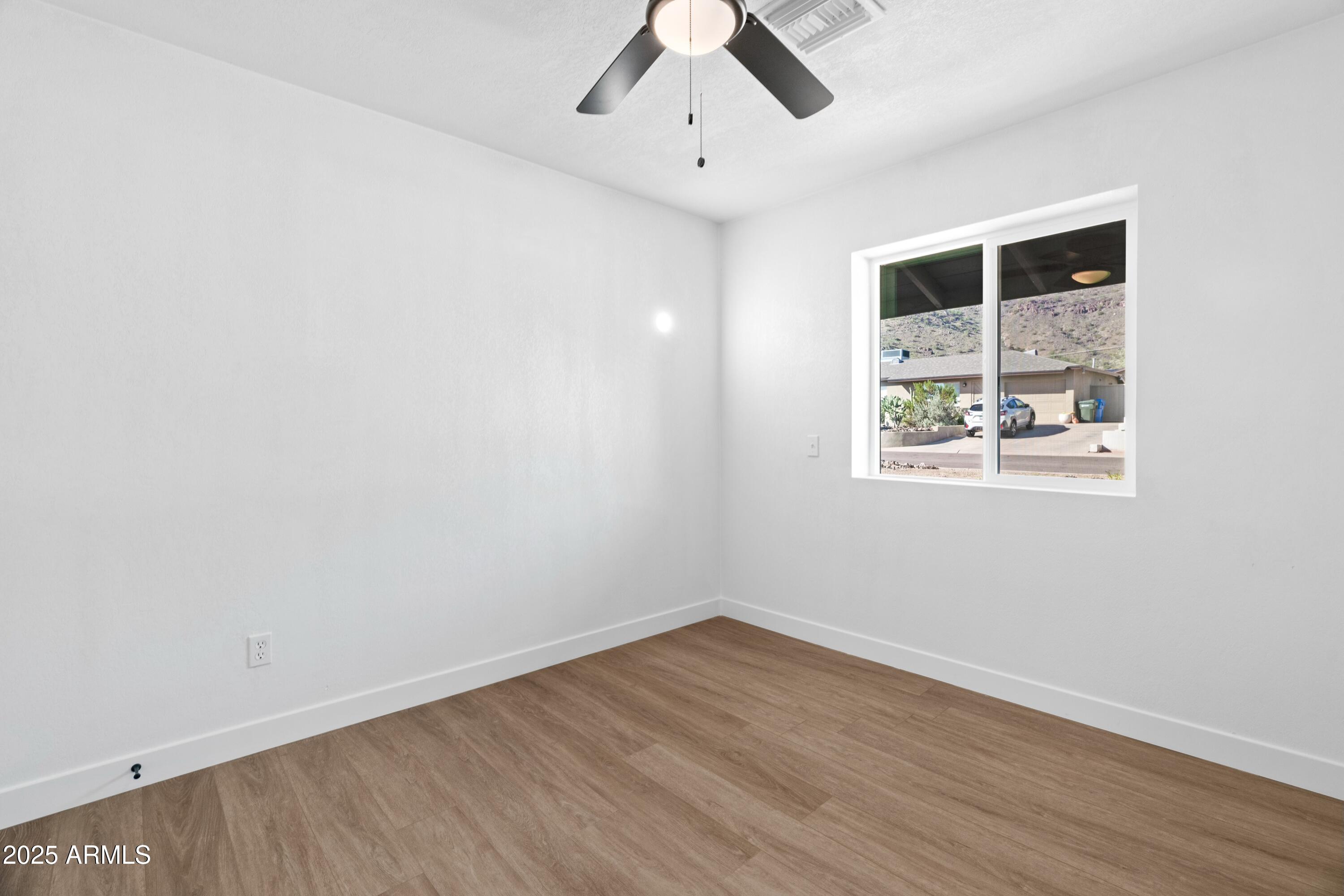 901 West Mercer Lane Phoenix, AZ 85029 - Photo 29 of 40 wooden floor in an empty room