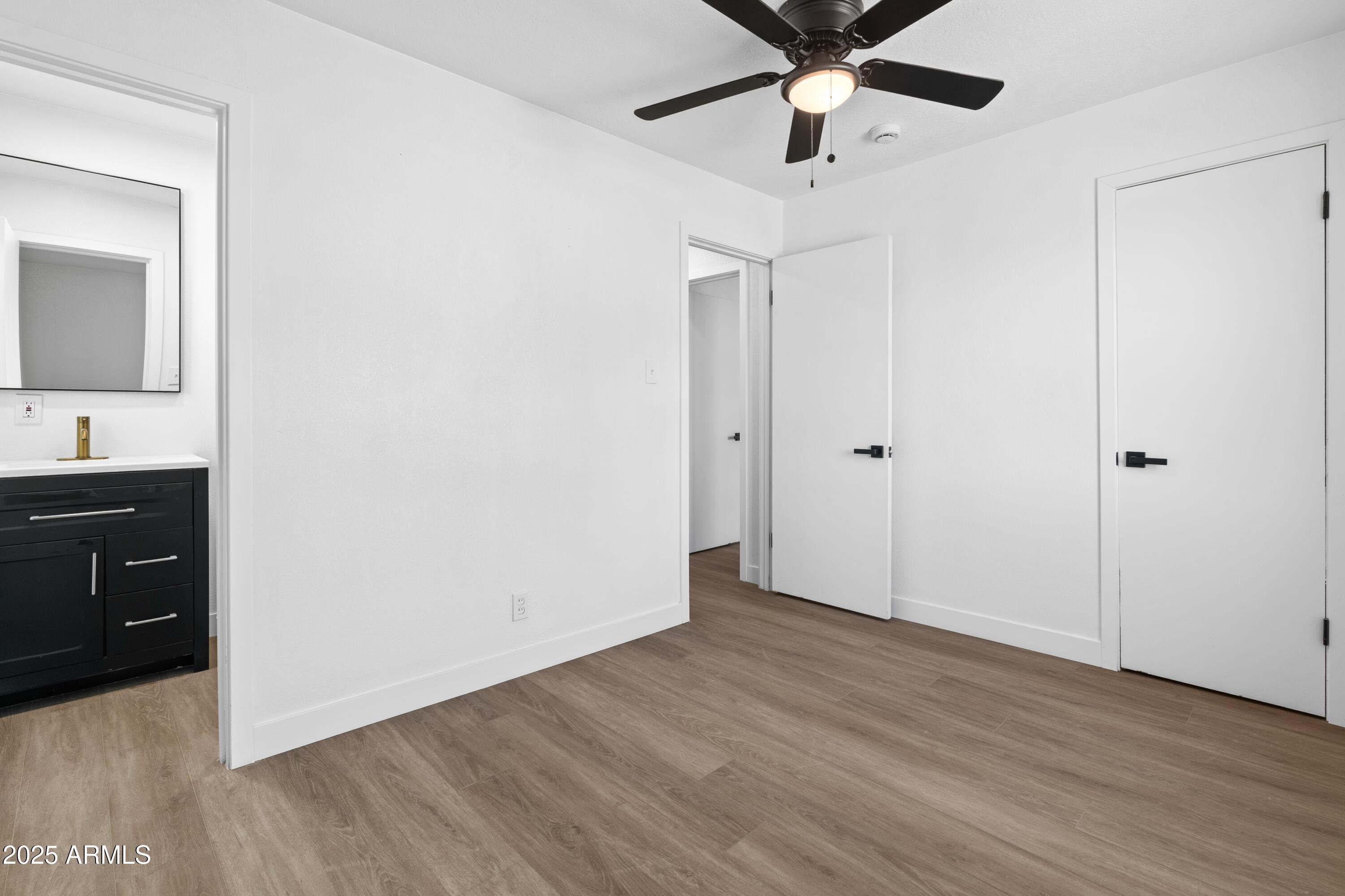 901 West Mercer Lane Phoenix, AZ 85029 - Photo 32 of 40 a view of an entryway with wooden floor