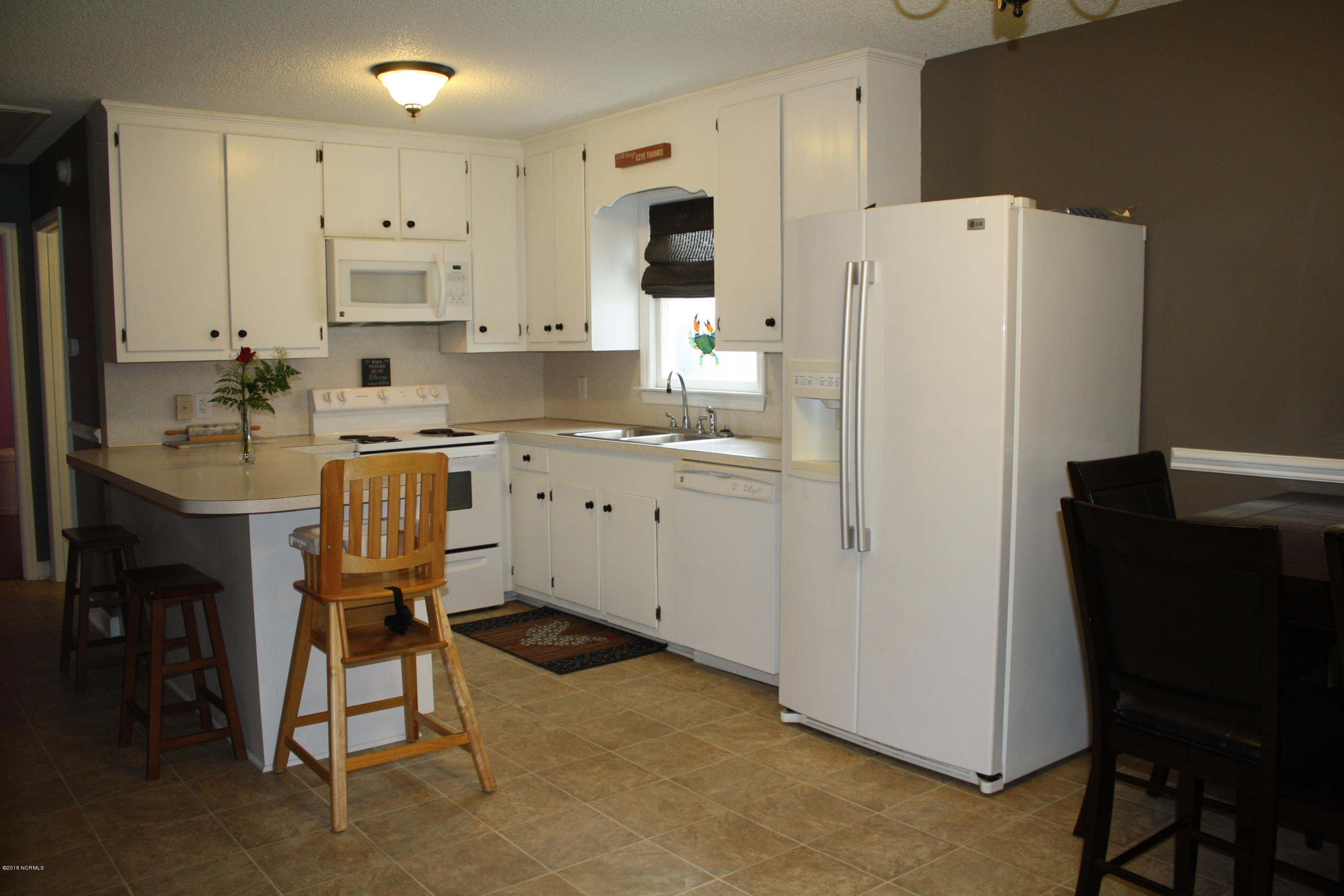 80 Pocosin Road Washington, NC 27889 - Photo 8 of 33 Kitchen Overlooking Backyard