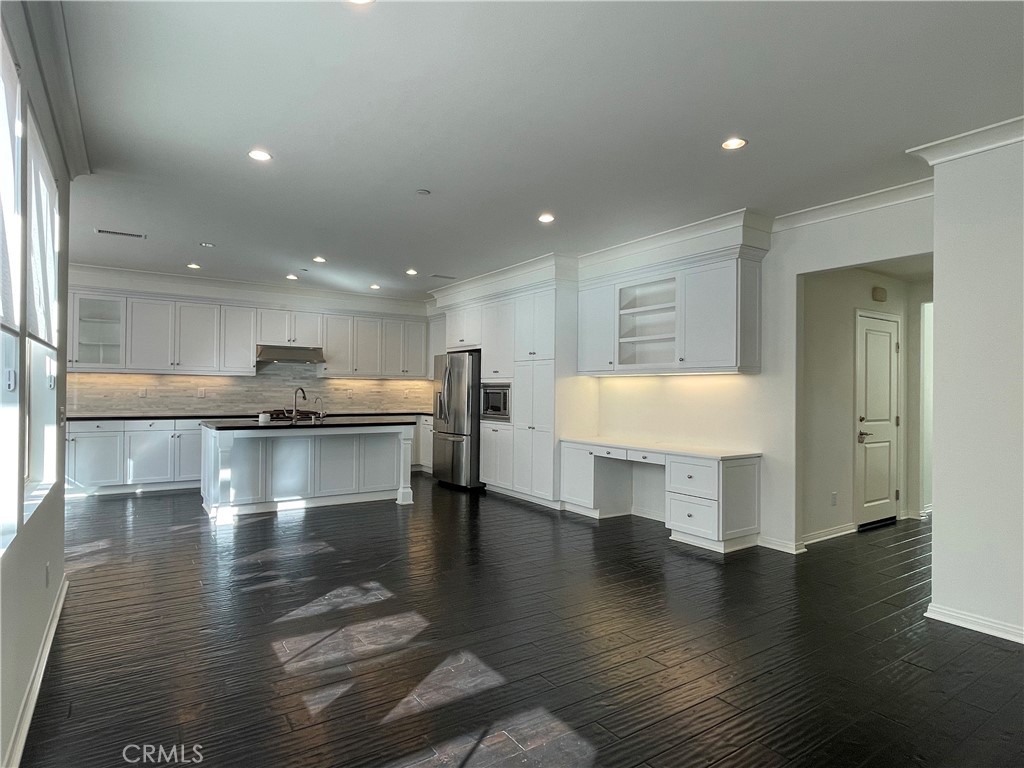 108 Pendant Irvine, CA 92620 - Photo 12 of 36 a view of kitchen with kitchen island table and chairs in it