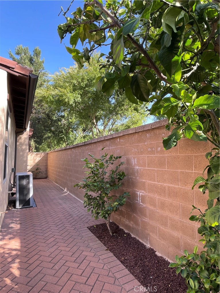 108 Pendant Irvine, CA 92620 - Photo 16 of 36 a view of a garden with a chair
