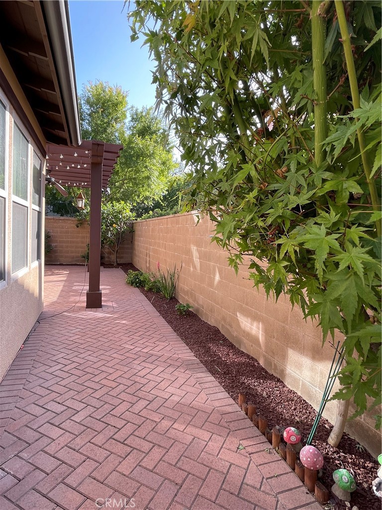 108 Pendant Irvine, CA 92620 - Photo 18 of 36 a view of a pathway with a tree