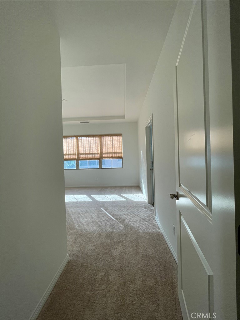 108 Pendant Irvine, CA 92620 - Photo 19 of 36 a view of empty room with wooden floor and fan