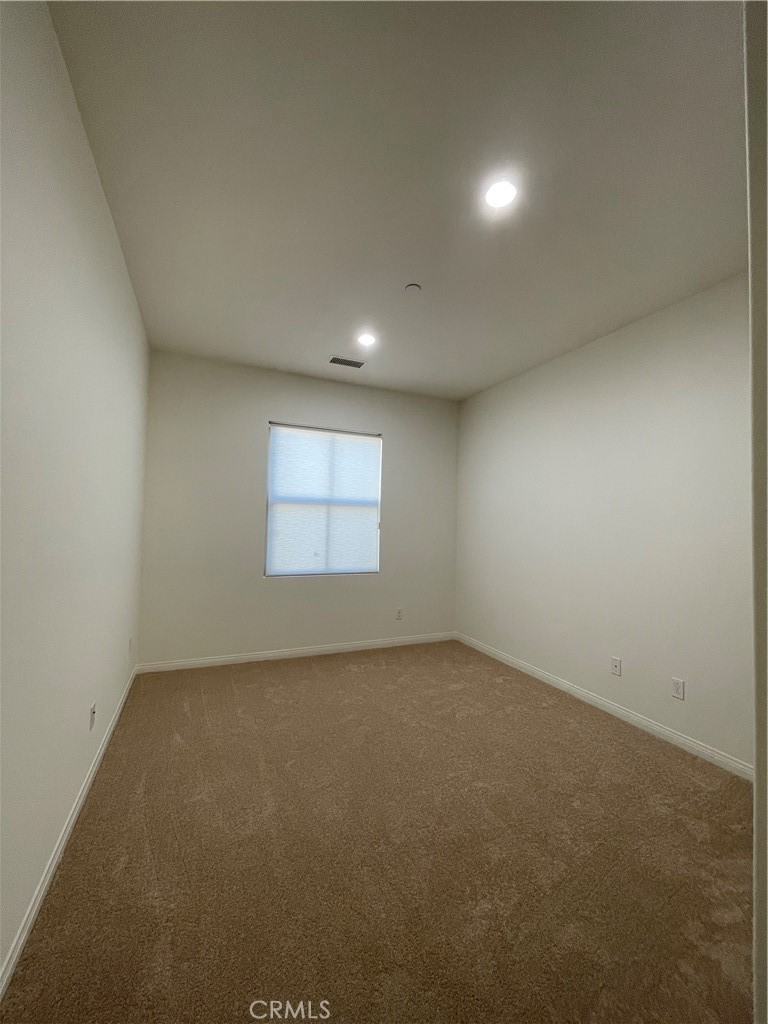 108 Pendant Irvine, CA 92620 - Photo 30 of 36 an empty room with a empty space and windows