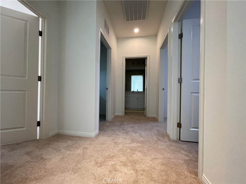 108 Pendant Irvine, CA 92620 - Photo 32 of 36 an empty room with closet and windows