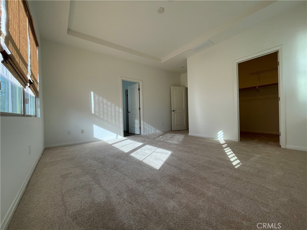 108 Pendant Irvine, CA 92620 - Photo 34 of 36 a view of an empty room with a fireplace and a window