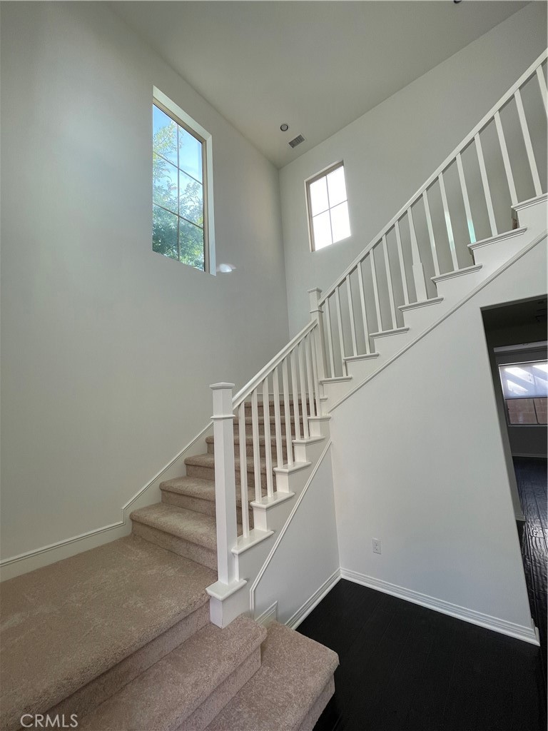 108 Pendant Irvine, CA 92620 - Photo 5 of 36 a view of entryway and hall with wooden floor