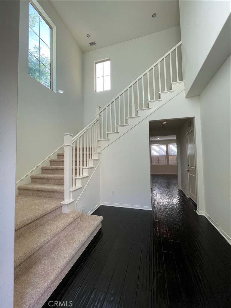 108 Pendant Irvine, CA 92620 - Photo 6 of 36 a view of entryway and hall with wooden floor