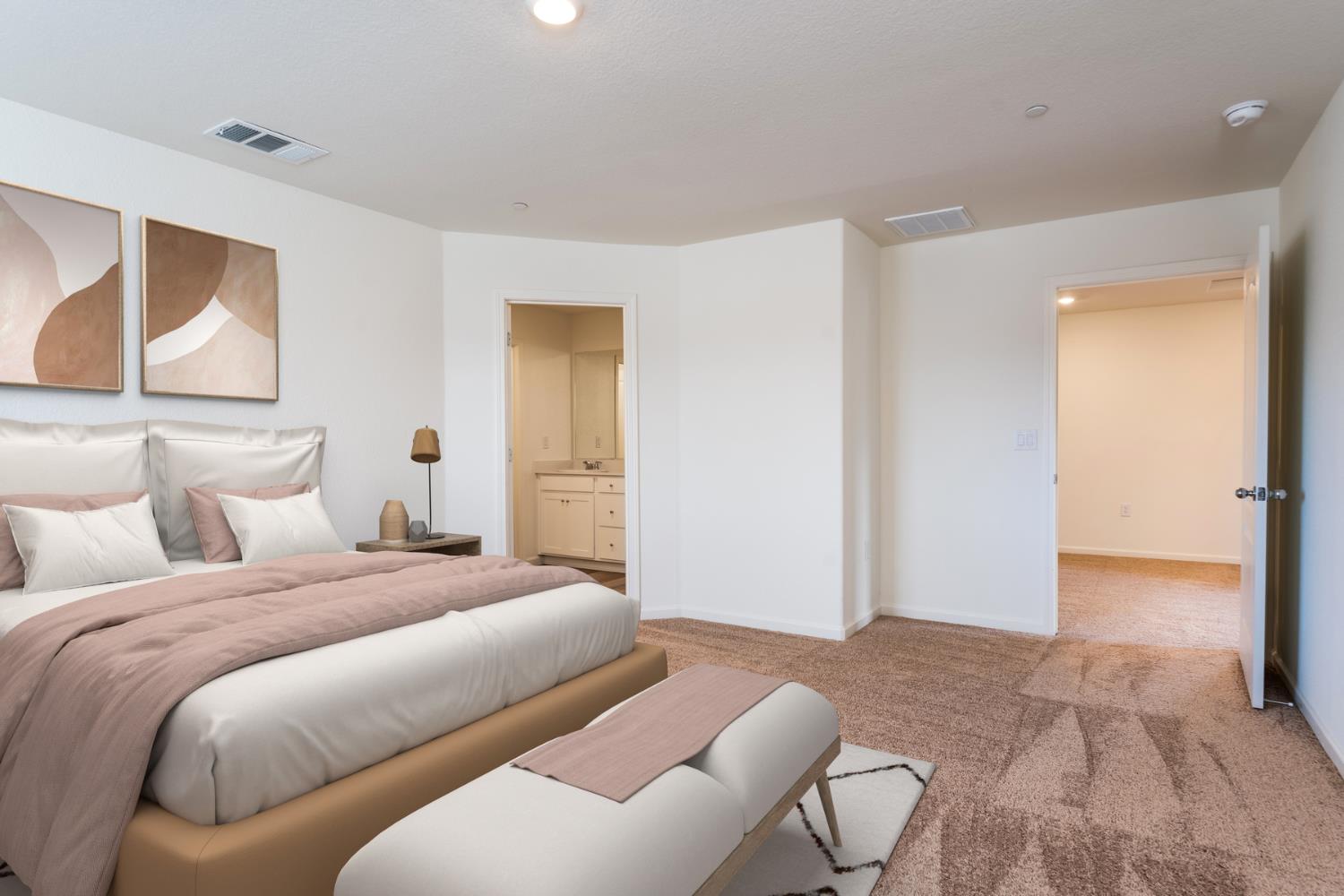 2289 Travis Court Newman, CA 95360 - Photo 14 of 21 a bedroom with a bed and a painting on the wall