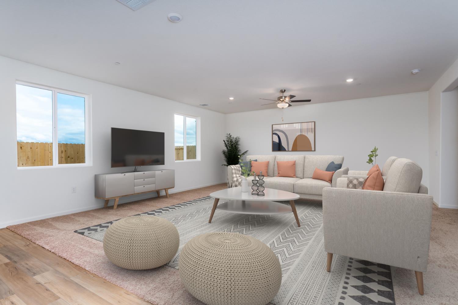 2289 Travis Court Newman, CA 95360 - Photo 10 of 21 a living room with furniture and a flat screen tv