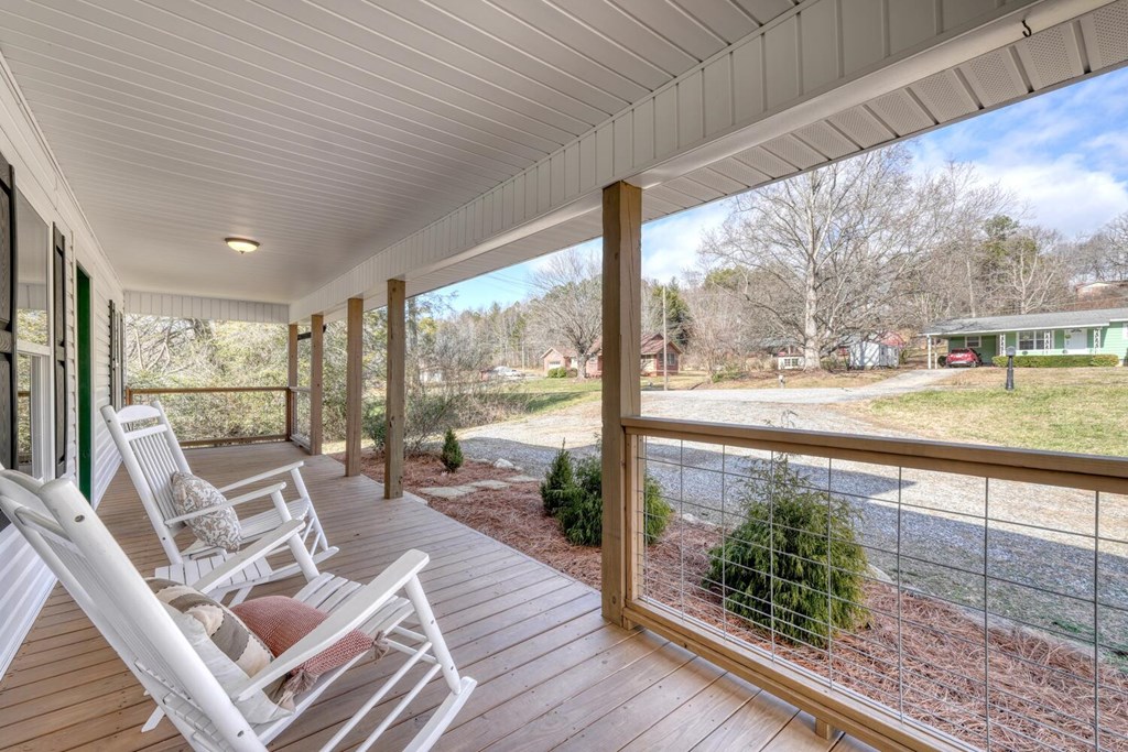 734 Bell Creek Road Hiawassee, GA 30546 - Photo 15 of 30 a living room with large windows