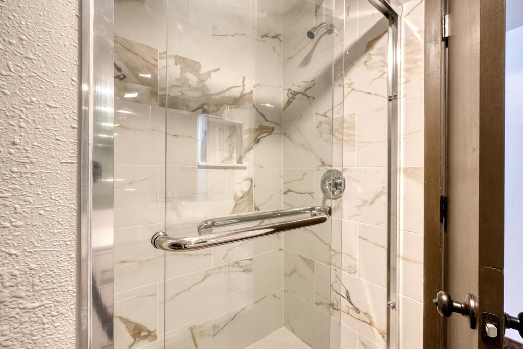 734 Bell Creek Road Hiawassee, GA 30546 - Photo 21 of 30 a bathroom with a shower