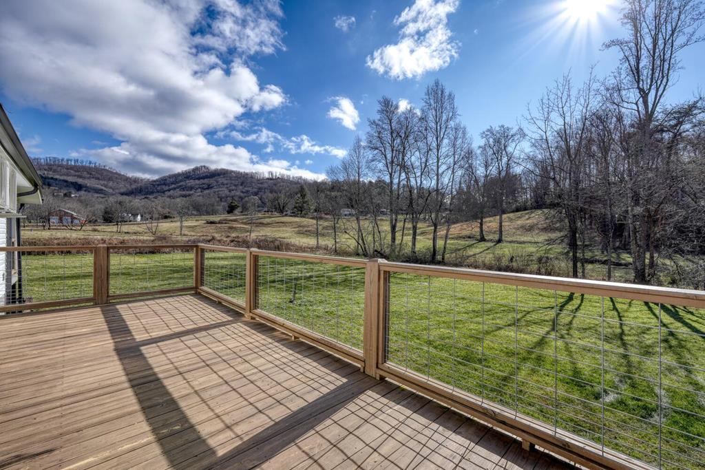 734 Bell Creek Road Hiawassee, GA 30546 - Photo 24 of 30 a view of outdoor space with swimming pool table and chair