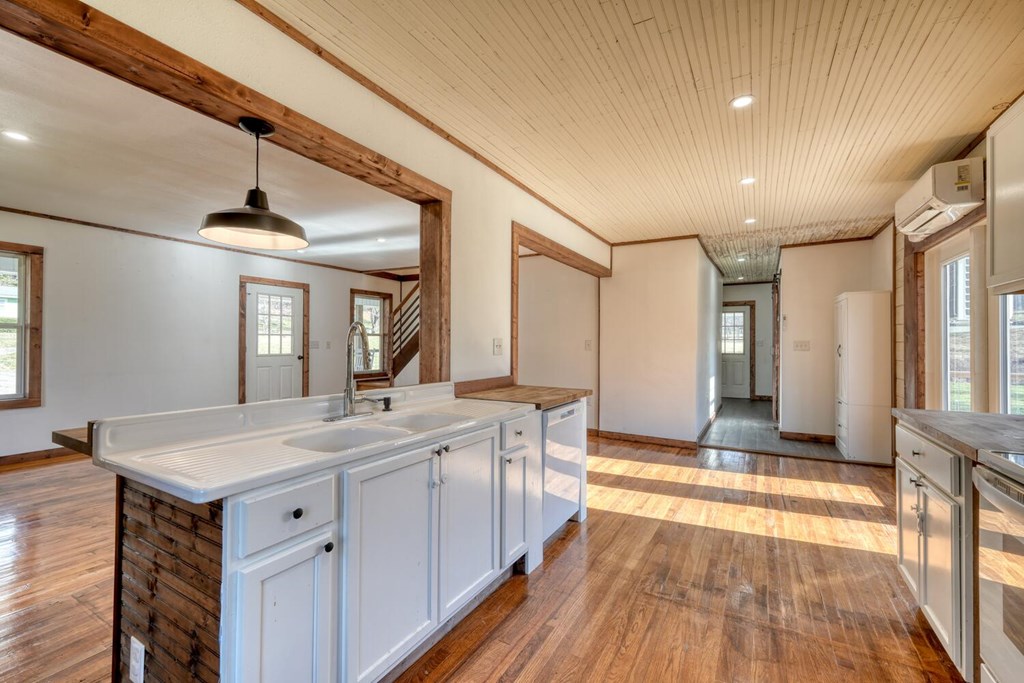 734 Bell Creek Road Hiawassee, GA 30546 - Photo 7 of 30 a spacious bathroom with a sink and a mirror