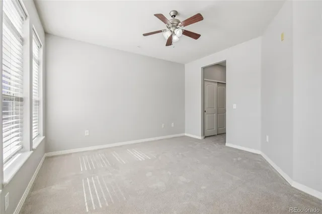 an empty room with a empty space and a window