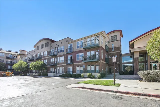 a view of a building with a street