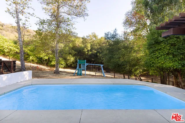 a house view with a outdoor space